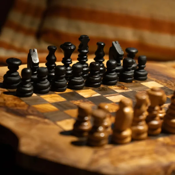 Olive wood chess board grain detail, handcrafted Carthage Collection