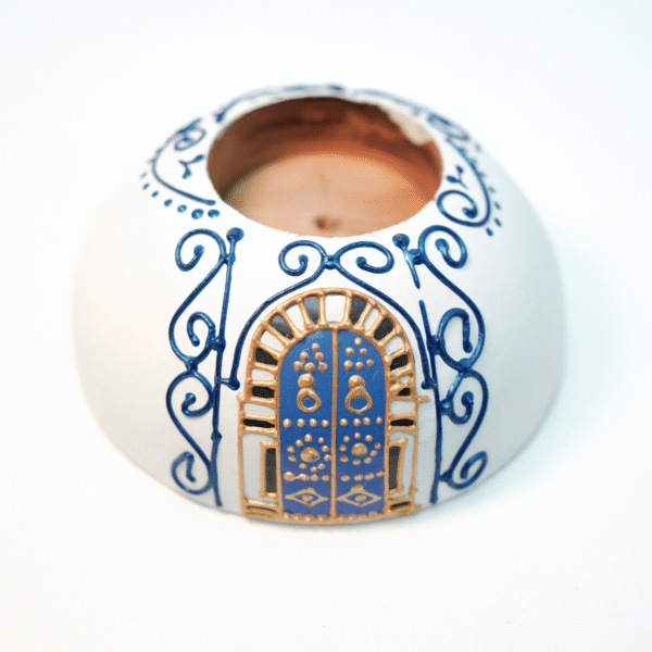 Round Painted Olive Wood Candle Holder 1 Olive wood candle holder, close-up of painted detail
