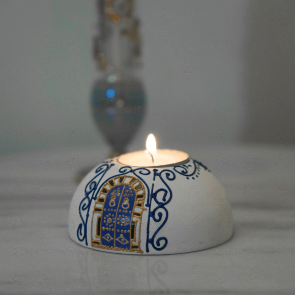 Round Painted Olive Wood Candle Holder 5 Hand-painted olive wood candle holder, angled view