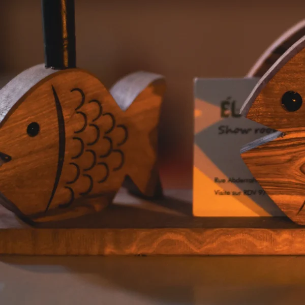 22 Olive wood fish sculpture, close-up of grain