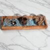 Tray with ceramic Olive wood ceramic serving tray, close-up of blue tiles