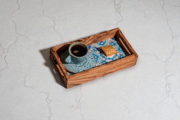 Ceramic Tray (2) Olive wood ceramic serving tray, close-up of tile