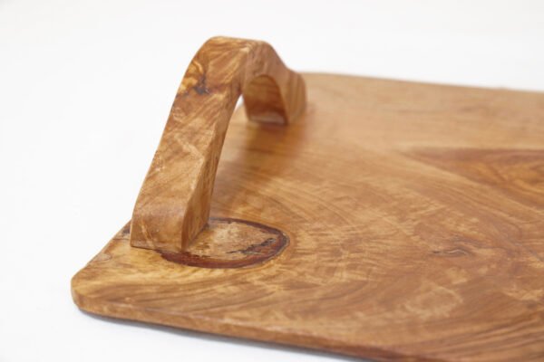Olive wood serving tray, close-up of handle